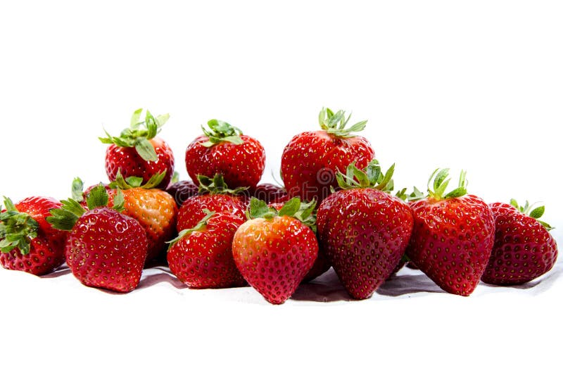 Morango doce super; s com partes superiores verdes fotos de stock