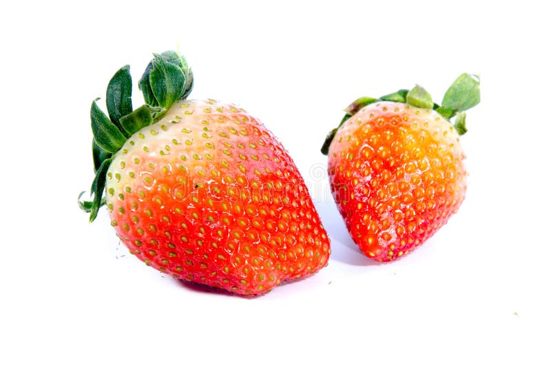 Morango doce super; s com partes superiores verdes fotografia de stock royalty free