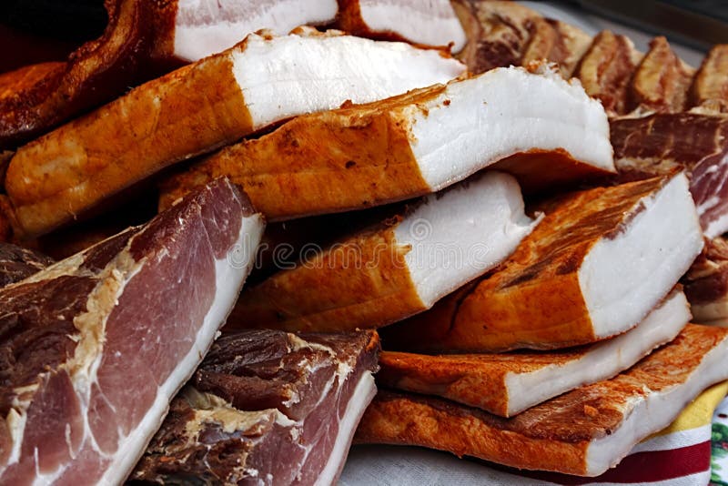 Morceaux de porc fumé bacon-1 photo libre de droits Morceaux de porc fumé bacon-1 photo libre de droits