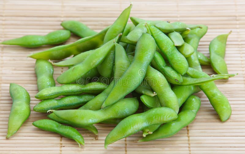 Edamame nibbles, boiled green soy beans, japanese food. Edamame nibbles, boiled green soy beans, japanese food