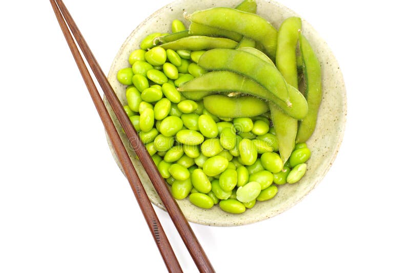 Edamame nibbles, boiled green soy beans, japanese food isolated on white. Edamame nibbles, boiled green soy beans, japanese food isolated on white