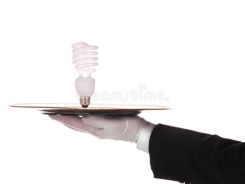 Butler with Compact fluorescent bulb on tray isolated on white. Butler with Compact fluorescent bulb on tray isolated on white
