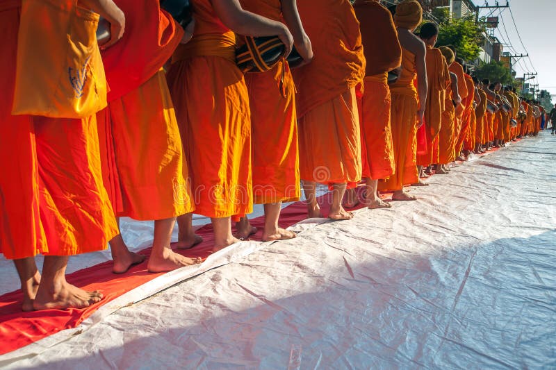 More monks with give alms bowl which came out of the offerings in the morning at Buddhist temple, Culture Heritage Site. More monks with hand holding give alms royalty free stock images More monks with give alms bowl which came out of the offerings in the morning at Buddhist temple, Culture Heritage Site. More monks with hand holding give alms royalty free stock images