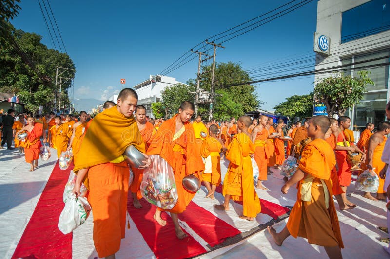 More monks with give alms bowl which came out of the offerings in the morning at Buddhist temple, Culture Heritage Site. More monks with hand holding give alms stock photos More monks with give alms bowl which came out of the offerings in the morning at Buddhist temple, Culture Heritage Site. More monks with hand holding give alms stock photos