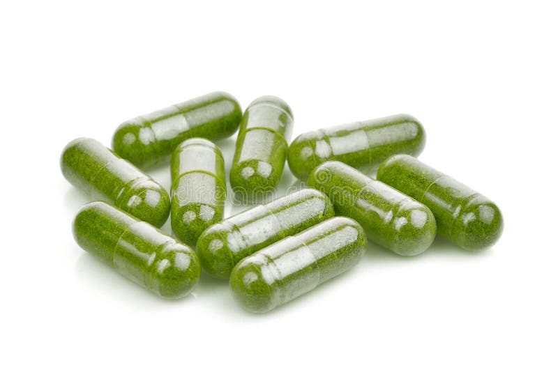 Moringa oleifera kapsuła odizolowywająca na bielu obrazy royalty free