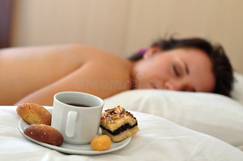 Morning coffee in a bed royalty free stock image
