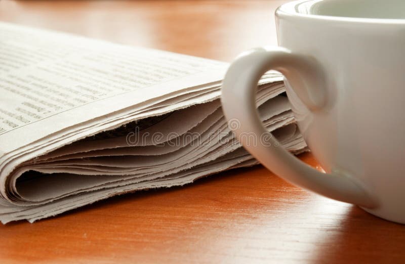 Morning coffee and newspaper.