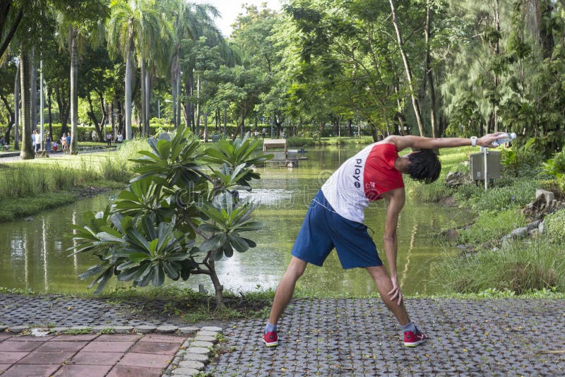 Morning exercises in Lumphini Park, Bangkok, Thailand