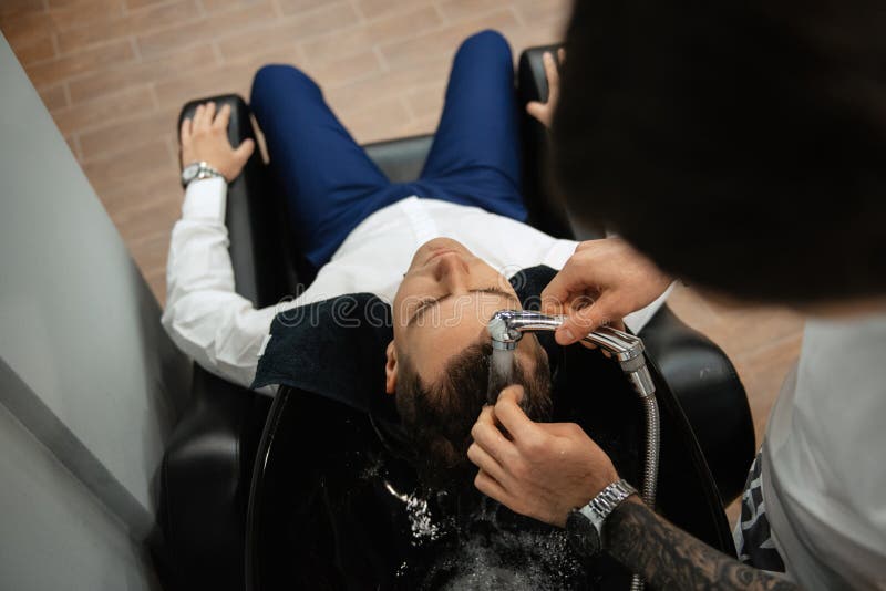 Groom in the barber shop stock photo. Image of equality 271801050