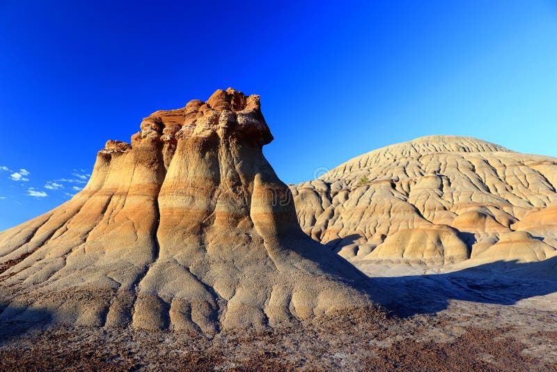 Early Morning Light on Hoodoos in Badlands Landscape along Grand Coulee Trail, Dinosaur Provincial Park, Alberta, Canada