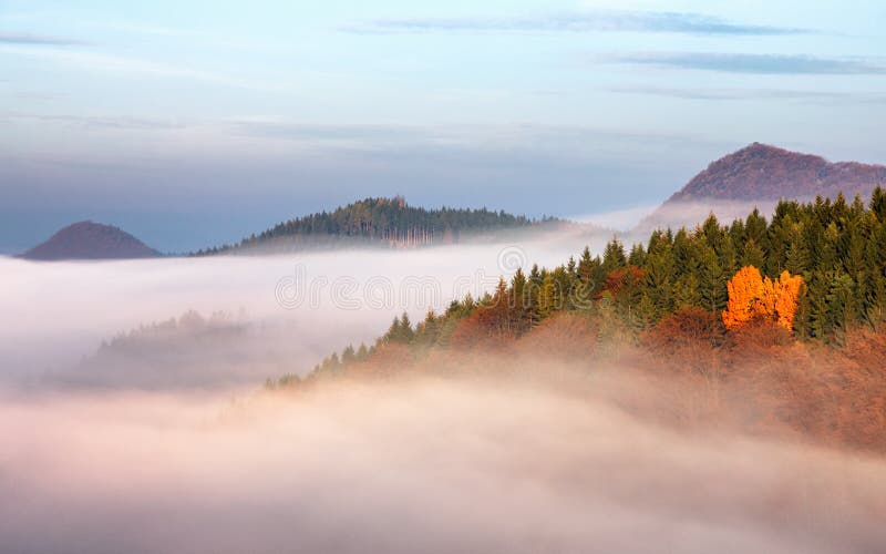 Morning mist defiling the valley.