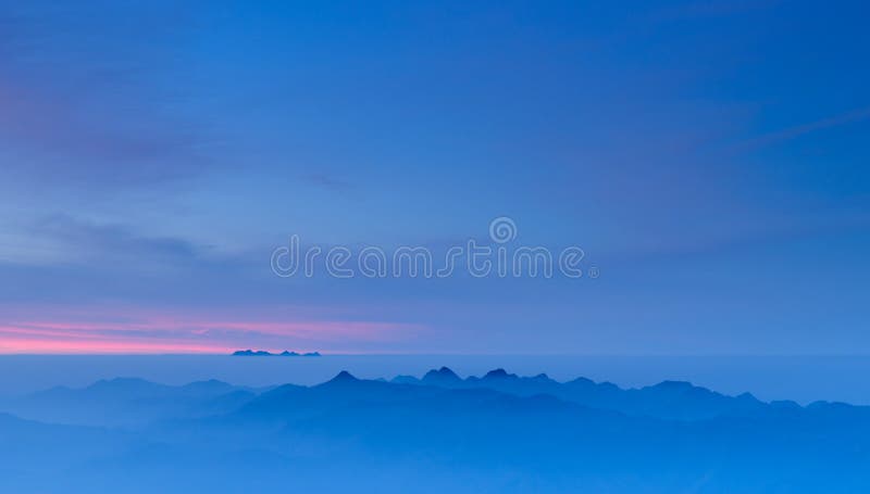 Morning Mist at Tropical Mountain Range at sunrise