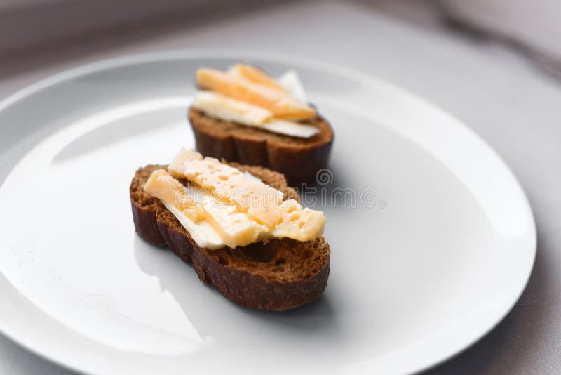 Morning Sandwiches with Coffee. Bread with Cheese and Butter Stock