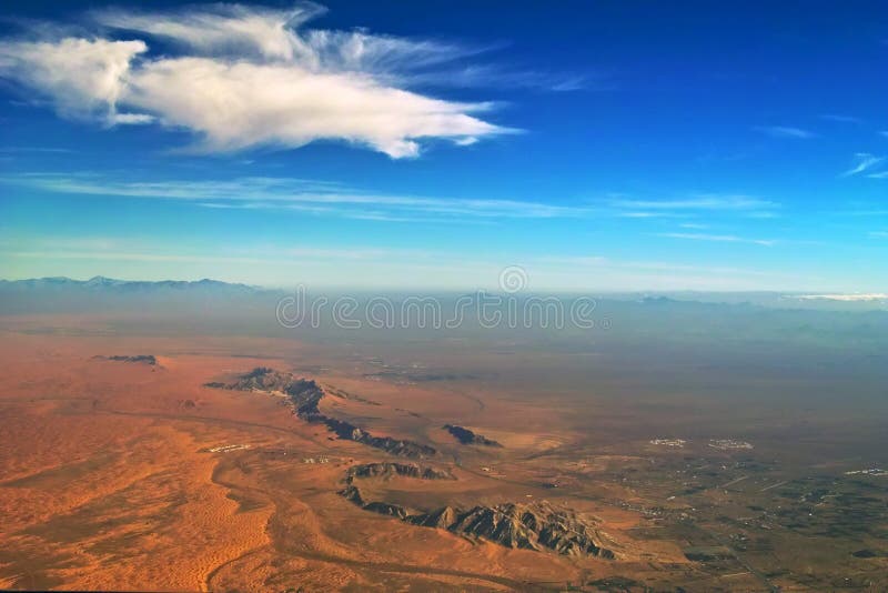 Morning sky of beautiful desert, mountains & oasis