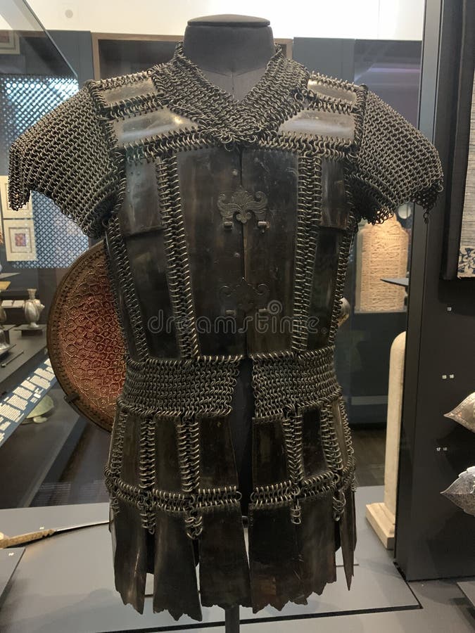 Moro armour kurab-a-kulang made of plates of carabao water buffalo horn linked with brass chainmail and silver clasps inspired by Japanese and Chinese examples. Moro armours such as ours consist of plates and chainmail invariably laid out in three distinct parts: torso plates, abdominal chainmail section, lower body and hip plates. Moro armour kurab-a-kulang made of plates of carabao water buffalo horn linked with brass chainmail and silver clasps inspired by Japanese and Chinese examples. Moro armours such as ours consist of plates and chainmail invariably laid out in three distinct parts: torso plates, abdominal chainmail section, lower body and hip plates.