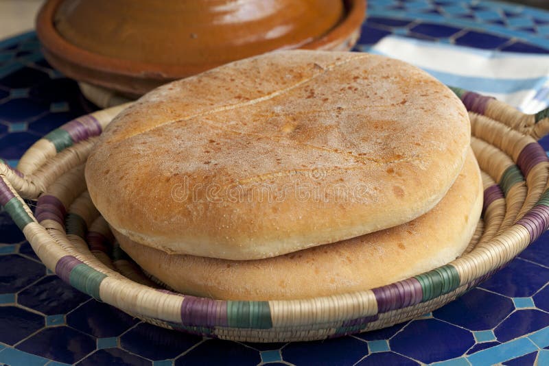 Moroccan bread and tagine stock image. Image of table 40729177