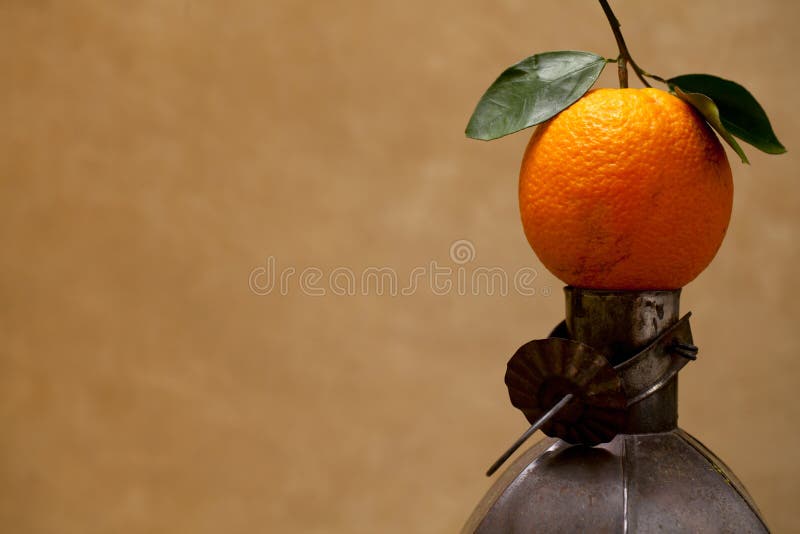 Moroccan orange fruit on old metal lamp