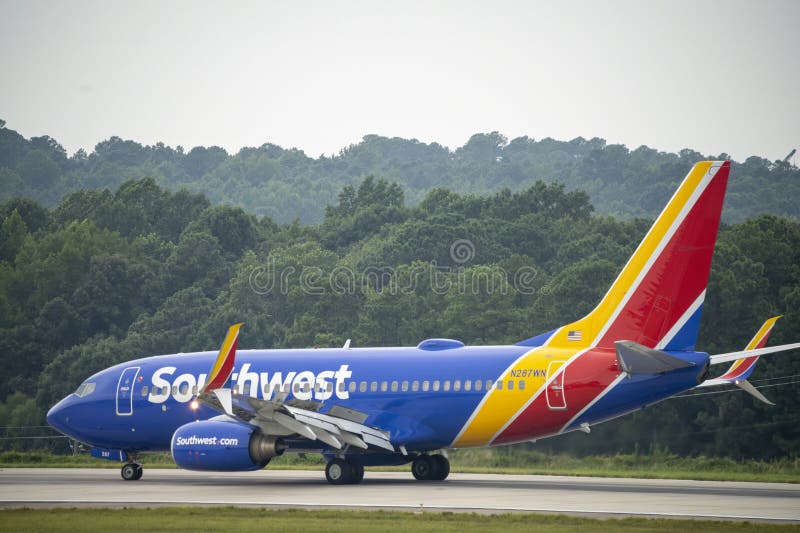 Southwest jet after landing at RDU on an overcast day. Southwest jet after landing at RDU on an overcast day.