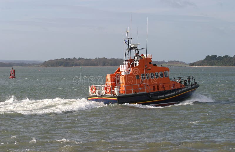 Lifeboat under way in Poole Harbour. Lifeboat under way in Poole Harbour