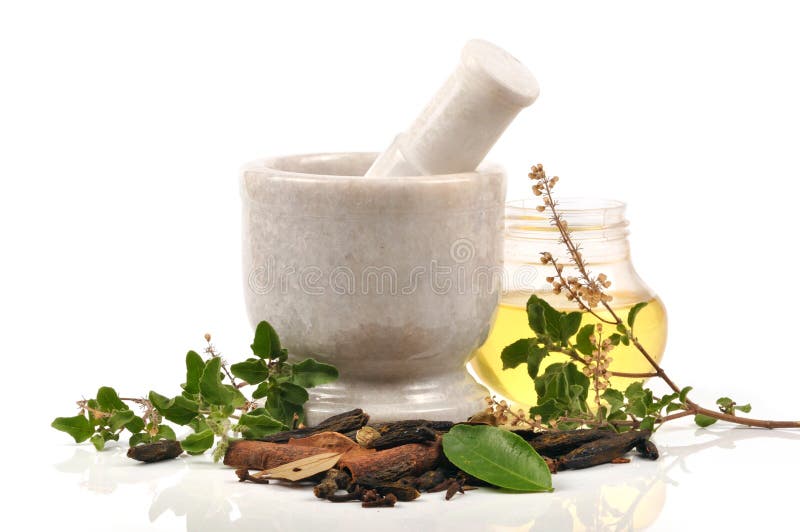 Mortar. Oil and herbals around the mortar Mortar. Oil and herbals around the mortar
