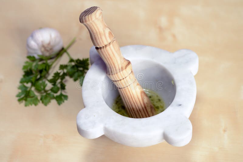 Mortar garlic and parsley