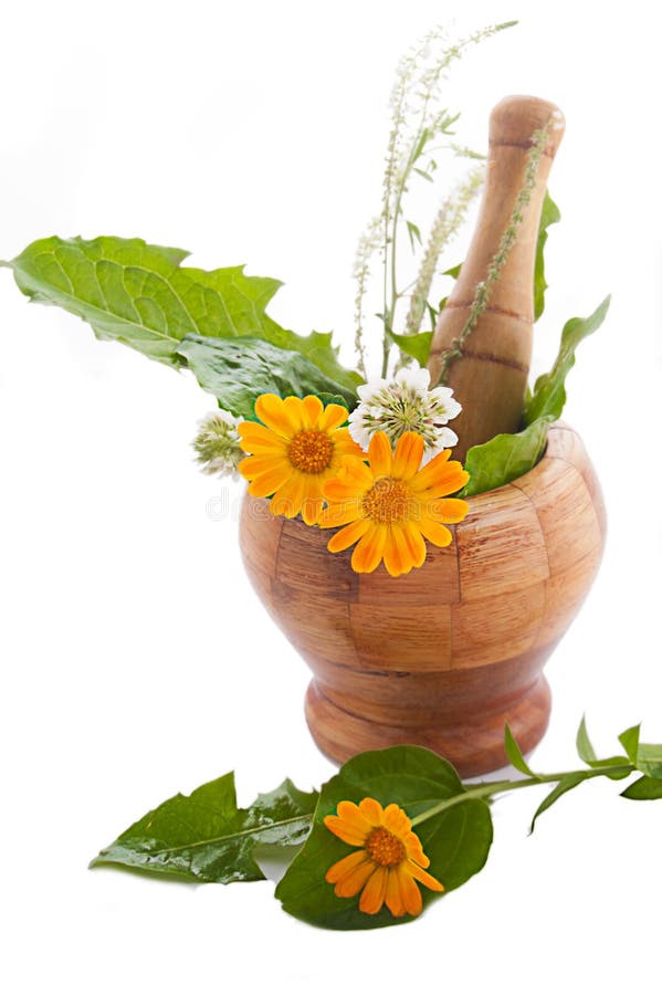 Mortar with herbs and marigolds
