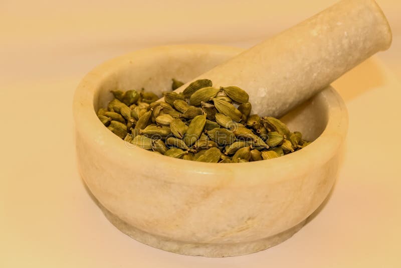 Mortar and Pestle with Green Cardamon Elachi Spices Stock Photo Image