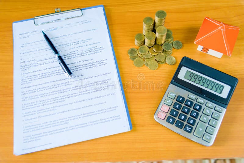 Mortgage contract for sale of real estate property royalty free stock photography Mortgage contract for sale of real estate property royalty free stock photography