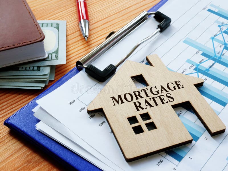 Mortgage rates sign on the home and charts