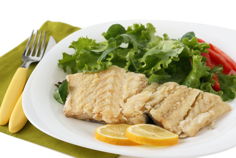 Morues bouillies avec de la salade images stock Morues bouillies avec de la salade images stock