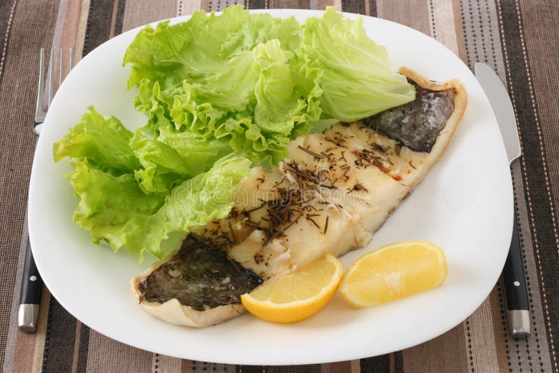 Morues bouillies avec le citron image libre de droits Morues bouillies avec le citron image libre de droits