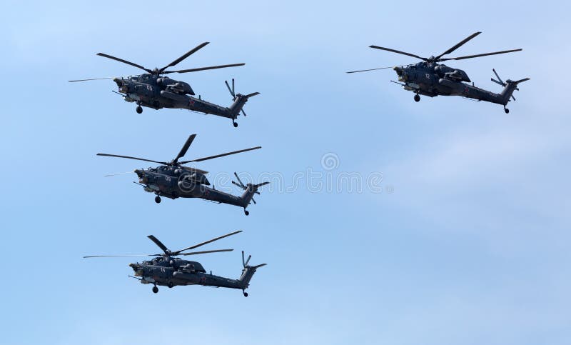 MOSCOW,RUSSIA - MAY 9,2015: Victory Parade in Red Square to commemorate 70th anniversary of capitulation of Nazi Germany in 1945. Mil Mi-28 (Havoc). MOSCOW,RUSSIA - MAY 9,2015: Victory Parade in Red Square to commemorate 70th anniversary of capitulation of Nazi Germany in 1945. Mil Mi-28 (Havoc)