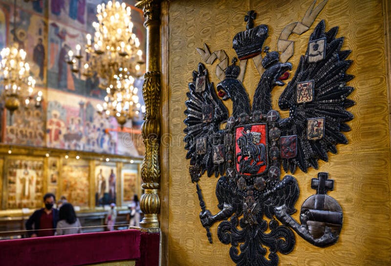 Eagle as coat of arms of Russian Empire on royal throne inside the Dormition Assumption Cathedral in Moscow Kremlin, Russia