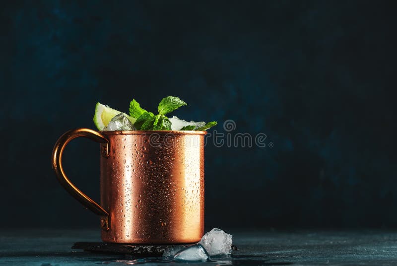 Moscow Mule Cocktail in Copper Mug with Lime, Ginger Beer, Vodka and