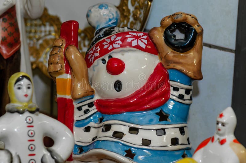 Moscow, Russia - March 19, 2017: Ceramic lamp in the form of a cartoon character, hockey player, snowman-goalkeeper royalty free stock photography Moscow, Russia - March 19, 2017: Ceramic lamp in the form of a cartoon character, hockey player, snowman-goalkeeper royalty free stock photography