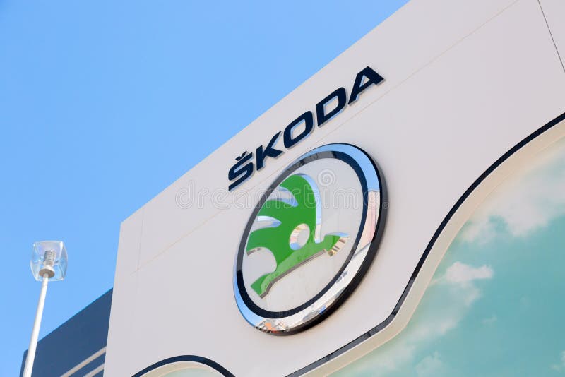 Moscow, Russia - May, 2018: Skoda Auto automobile manufacturer from Volkswagen Group company logo on dealership building against b stock photos Moscow, Russia - May, 2018: Skoda Auto automobile manufacturer from Volkswagen Group company logo on dealership building against b stock photos