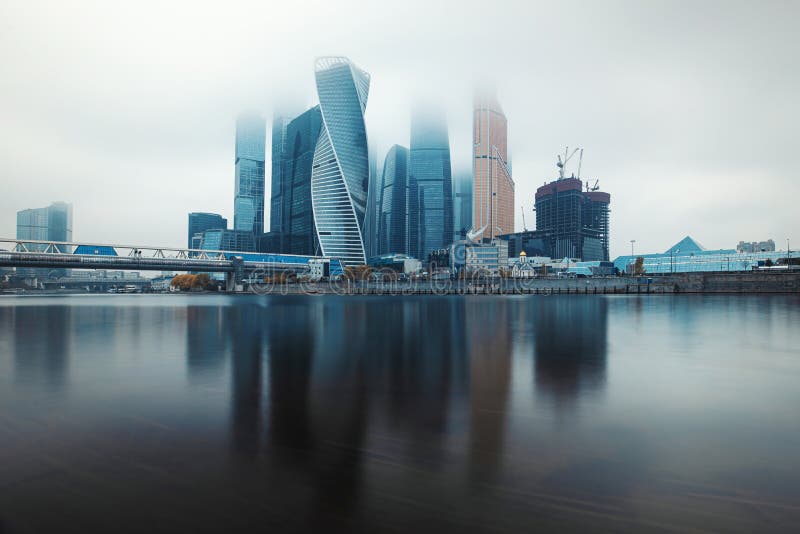 Moscow, Russia - November 3, 20209: Heights in the fog. Buildings of the business center Moscow City in a cityscape.