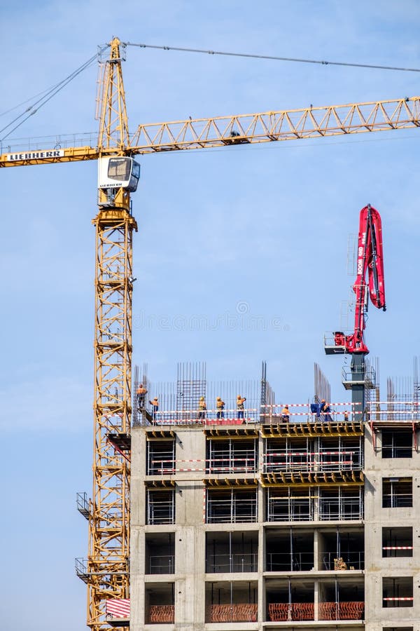 Moscow. Russia. September 06, 2020 View of the construction of a monolithic house against the background of the sky. A tower crane