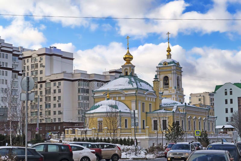 Moscow, Russian Federation Located in Transfiguration Square street view of new Church surrounding buildings and local traffic stock photos Moscow, Russian Federation Located in Transfiguration Square street view of new Church surrounding buildings and local traffic stock photos