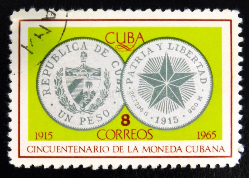 MOSCOW, RUSSIA - JULY 15, 2017: Rare stamp printed in Cuba shows silver coin one Peso, 1934, 50th Anniversary of Cuban currency, circa 1965. MOSCOW, RUSSIA - JULY 15, 2017: Rare stamp printed in Cuba shows silver coin one Peso, 1934, 50th Anniversary of Cuban currency, circa 1965