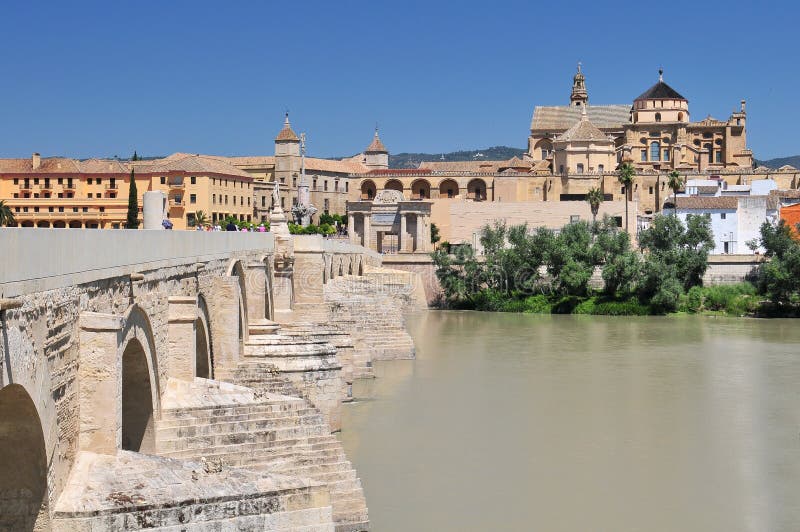 Mosque Cathedral La Mezquita and Roman Bridge on Guadalquivir river in Cordoba, Spain, Andalusia region. royalty free stock image Mosque Cathedral La Mezquita and Roman Bridge on Guadalquivir river in Cordoba, Spain, Andalusia region. royalty free stock image