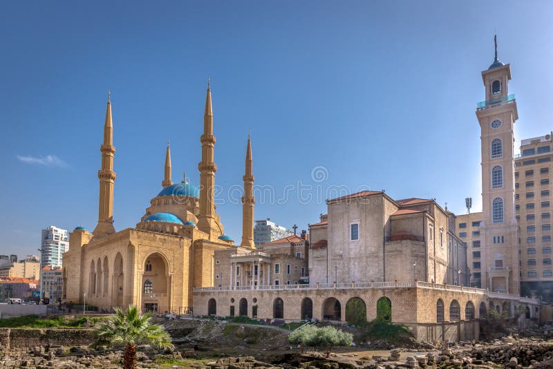 A mosque and a church together in Beirut, capital of Lebanon in a blue sky day