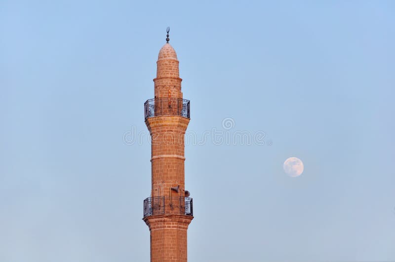 Mosque tower and moon