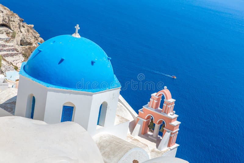 The most famous church on Santorini Island,Crete, Greece. Bell tower and cupolas of classical orthodox Greek church stock images The most famous church on Santorini Island,Crete, Greece. Bell tower and cupolas of classical orthodox Greek church stock images