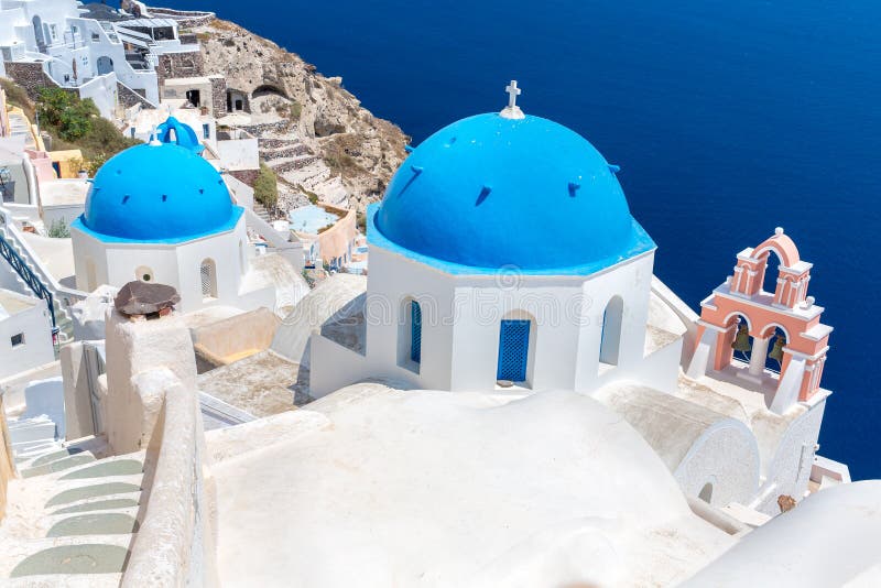 The most famous church on Santorini Island,Crete, Greece. Bell tower and cupolas of classical orthodox Greek church royalty free stock images The most famous church on Santorini Island,Crete, Greece. Bell tower and cupolas of classical orthodox Greek church royalty free stock images