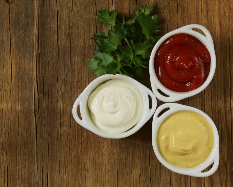 Mustard, ketchup and mayonnaise - three kinds of sauces. Mustard, ketchup and mayonnaise - three kinds of sauces