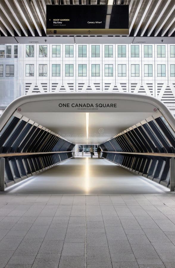 Modern tunnel of one canada square bridge in Canary Wharf. Modern tunnel of one canada square bridge in Canary Wharf