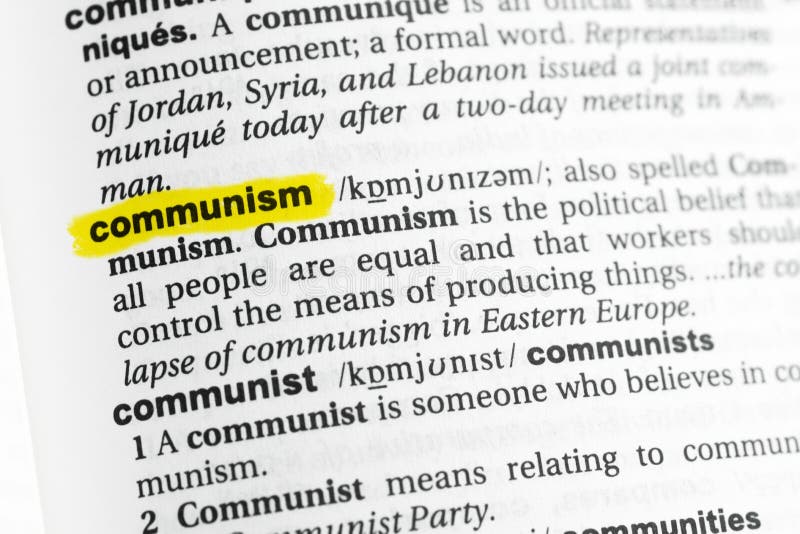 Mot anglais accentué et x22 ; communism& x22 ; et sa définition au dictionnaire photographie stock libre de droits Mot anglais accentué et x22 ; communism& x22 ; et sa définition au dictionnaire photographie stock libre de droits