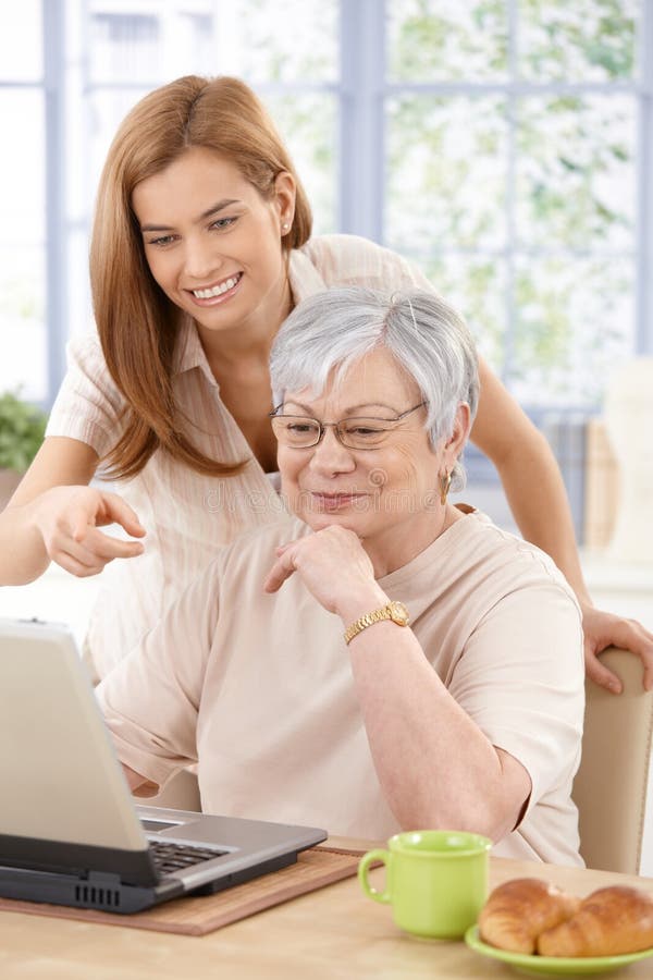Mother and adult daughter having fun smiling royalty free stock photo Mother and adult daughter having fun smiling royalty free stock photo