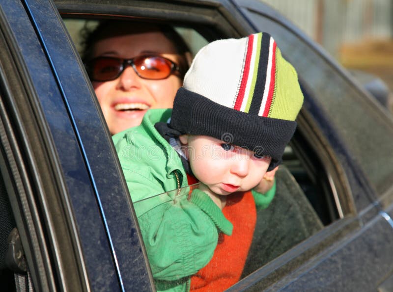 Mother with baby in car